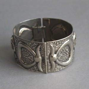 Wide vintage bangle bracelets silver-colored metal with Egyptian motifs