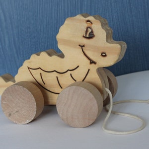 Wooden toy, pull-along toy, small wooden dragon with pyrography