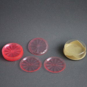 12 pink vintage coasters with storage box from the 50s