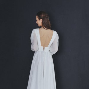 Boho Chiffon Wedding Gown - Long Sleeve A-Line Dress featuring an Open Back Square Neck and Elegant Train - Perfect Boho Wedding Celebration