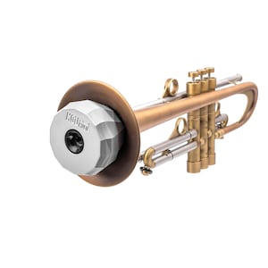 May include: A brass trumpet with a brushed finish featuring three valves and a silver-colored, faceted geometric mute inserted into the bell. The mute is clearly marked with the text KGU Music on its front surface, contrasting with the metallic body.
