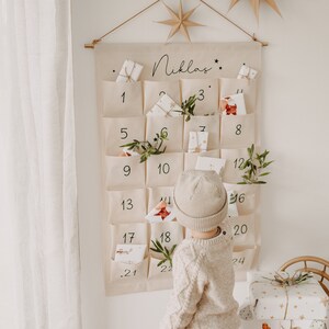 Personalisierter Adventskalender aus Stoff mit 24 Taschen & Name zum selbst befüllen als nachhaltiger und wiederverwendbarer Kalender
