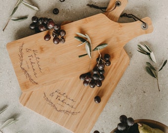 Personalized cutting board as a wedding gift with name or as a housewarming gift for couples and families