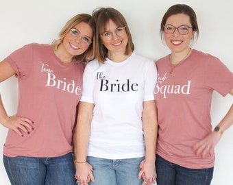 JGA Shirt The Bride or Team Bride or Bride Squad for the bachelorette party in six different colors and many imprint colors
