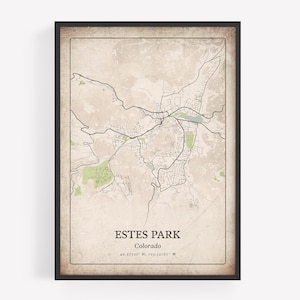 May include: Framed map print of Estes Park, Colorado, featuring a detailed road network and topographical features. The map has a vintage aesthetic with a beige background and black frame. Text includes the city name, state, and coordinates.