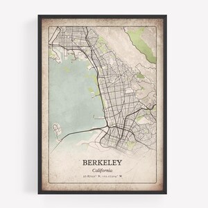 May include: Framed map print of Berkeley, California, in a vintage style. The map features a detailed street layout, with the city name and coordinates at the bottom. The color palette includes beige, green, and black.