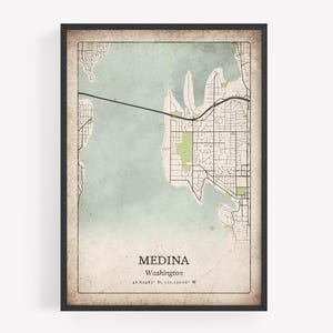 Può includere: Stampa su mappa incorniciata di Medina, Washington, con un'estetica vintage. La mappa presenta un layout dettagliato delle strade, corsi d'acqua e spazi verdi, con il nome della città e le coordinate. La cornice è nera.