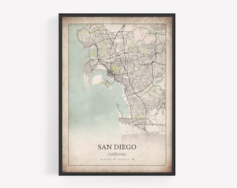 May include: Framed map print of San Diego, California, with a vintage aesthetic. The map features detailed street layouts, parks, and the coastline. The city name and state are displayed at the bottom, along with the coordinates.