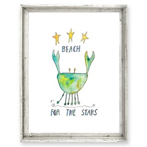 May include: A watercolor painting of a green crab with yellow stars above it. The text "Beach for the Stars" is written below the crab.