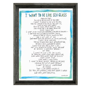 May include: A framed print with a blue and green watercolor background. The print features a handwritten poem titled "I Want to Be Like Sea Glass" with a message about the beauty of change and resilience.