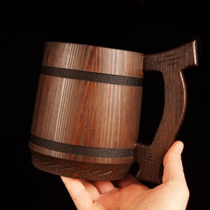 Our wooden beer mugs with a stainless steel insert inside: environmentally friendly, durable, attractively designed, and easy to use.
