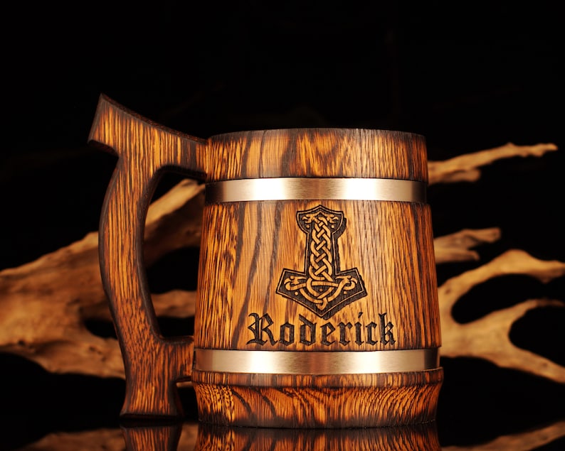 beer mug is made of natural oak and has a stainless steel insert Viking style, engraved your chosen name and symbol