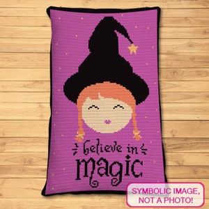 May include: Purple crochet pillow with a cartoon witch wearing a black hat and a yellow star. The text "Believe in magic" is written in black below the witch.