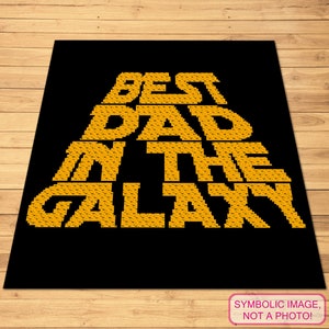 May include: A black background with the words "BEST DAD IN THE GALAXY" in yellow block letters.