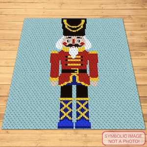 May include: A pixelated image of a red and blue nutcracker with a black hat and a white beard. The nutcracker is standing on a light blue background.