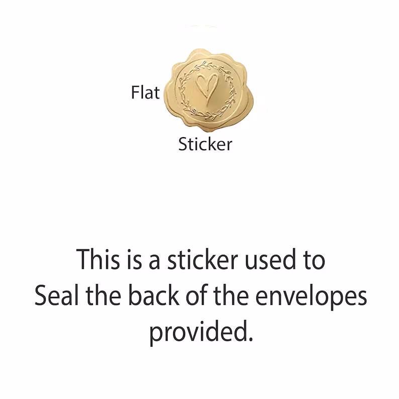 May include: A gold sticker with a heart design and a wreath around it. The sticker says "Flat Sticker" below it. This is a sticker used to seal the back of the envelopes provided.