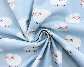 Cotton Jersey | Cotton knit fabric | Children&#39;s Fabric | Cotton jersey fabric kid | White sheeps on a pastel blue background