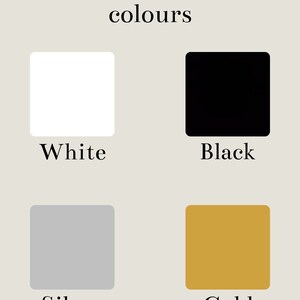 May include: Text, ornament colours: white, black, silver, gold. Four colour swatches are shown.