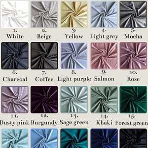 May include: Swatch card displaying 20 different velvet fabric colours. The colours are arranged in rows of five. The colours include white, beige, yellow, light grey, mocha, charcoal, coffee, light purple, salmon, rose, dusty pink, burgundy, sage green, khaki, forest green, aqua, sky blue, teal blue, dark blue, and black.