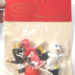 May include: A set of six small plastic Halloween-themed figurines in a clear plastic bag with a red cardboard header. The header displays the text SSCO, No. 1179, and Made in Hong Kong. The figures include a white ghost, a red devil, and a black figure.