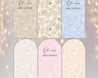 May include: Six arched cards featuring a repeating line art pattern of seashells and starfish. Each card displays the text Olivia's BABY SHOWER in a mix of script and serif fonts. The cards come in beige, cream, light blue, pale yellow, and pink.