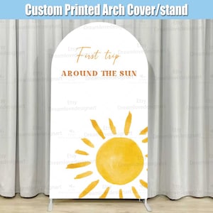 Puede incluir: Cubierta de arco blanca con un sol de acuarela y el texto "Primer viaje alrededor del sol".