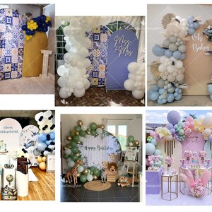 May include: A collection of six different party backdrops with balloon arches and decorations. The backdrops feature various themes, including a blue and white tile pattern, a light blue backdrop with the text "Mr & Mrs", a light brown backdrop with the text "Oh Baby", a light blue and white backdrop with a hot air balloon theme, a green and white backdrop with a jungle theme, and a pink and purple backdrop with a butterfly theme.