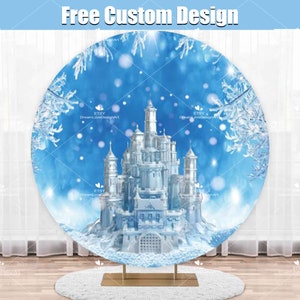May include: A round backdrop featuring a white castle with blue and white accents, surrounded by a snowy forest with a blue sky and white snowflakes. The backdrop is perfect for a winter wonderland themed party or photo shoot.