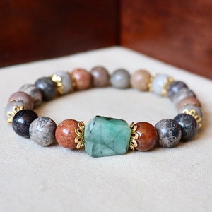 AAA Colombian emerald and AAA fossil coral bead bracelet