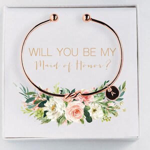 4 bracelets en or rose avec encadrés blancs et 1 carte BC011 et breloques lettre E et 3 breloques carte BC004 lettres M, S, W vers le Royaume-Uni SFE1021