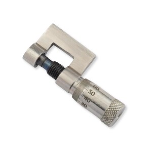 May include: A silver-colored metal micrometer head featuring a C-shaped frame, a threaded spindle, and a rotating thimble with engraved numerical markings ranging from 30 to 60, including a knurled grip section for precise manual adjustment.