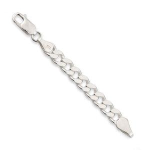 May include: A silver curb chain bracelet with a lobster clasp.