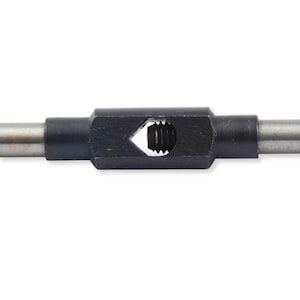 May include: A black metal tap wrench featuring a central rectangular body with a diamond-shaped opening that reveals internal threading. Two cylindrical silver-colored handles extend from the sides of the central black housing unit.