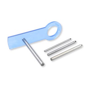 May include: A translucent blue acrylic tool with a circular handle and a single metal pin inserted through the body, accompanied by three additional separate metal pins of varying diameters, all featuring a smooth, cylindrical, silver-toned finish.