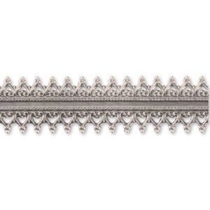 May include: Silver metal trim with a delicate, intricate design featuring a repeating pattern of small hearts and points. The trim has a slightly raised, textured centre band.