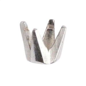 May include: Silver crown setting for a gemstone. The setting has a pointed, crown-like shape with six prongs.