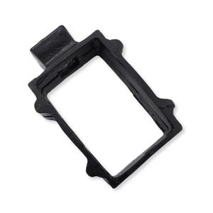 May include: A rectangular black metal frame with a textured finish. The frame features a small protruding tab on one of the shorter sides and four small rounded extensions along the longer sides, creating a distinct geometric shape.
