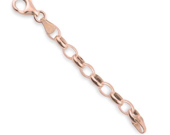 May include: A rose gold-toned metal chain extender featuring a series of polished oval links. One end of the chain is finished with a secure lobster claw clasp, while the other end features a small, flat, oval-shaped metal tag.