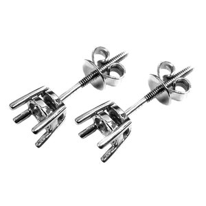 May include: Two silver earring settings with prongs for holding a gemstone. The settings have a screw-back closure.