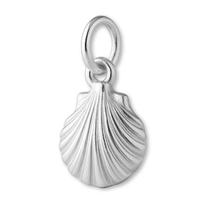 May include: A silver seashell charm with a detailed, ridged surface. The charm has a loop at the top for attaching to a necklace or bracelet. The seashell design is a classic nautical theme.