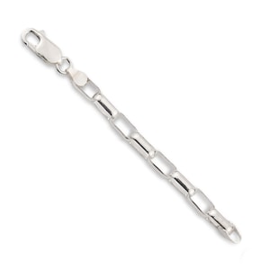 May include: A silver chain bracelet with a box chain design.