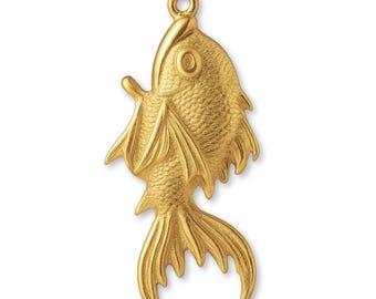 May include: A gold-toned metal fish pendant featuring a textured scale pattern, defined fins, and a circular loop at the top for attachment. The surface has a matte finish with raised details highlighting the eye and body structure.