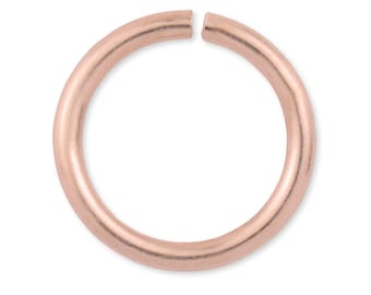 Peut inclure: Un anneau de jonction en or rose, un anneau métallique avec un espace, utilisé pour la fabrication de bijoux.