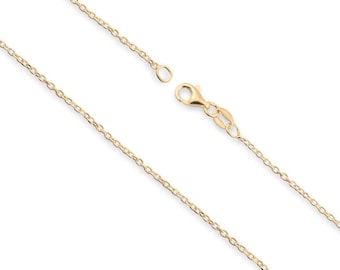 May include: A gold chain necklace featuring delicate interlocking oval links. The chain is equipped with a secure lobster claw clasp mechanism at one end, allowing for easy fastening and adjustment of the jewelry piece.