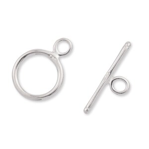 May include: Silver toggle clasp with a round loop and a straight bar. The clasp is made of sterling silver and is 9.5 mm in diameter.