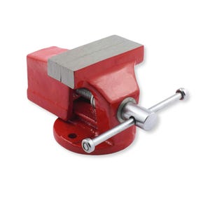 May include: A red metal bench vise featuring a silver-colored steel jaw and a horizontal handle. The tool has a circular base with mounting holes and a threaded screw mechanism for adjusting the width of the jaws to secure objects firmly.