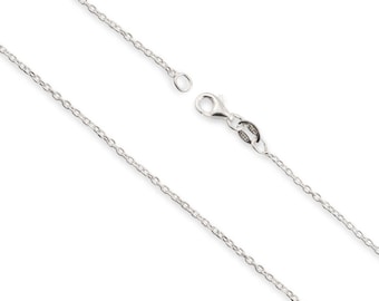 May include: A silver-colored metal chain necklace featuring a series of interconnected oval links. The chain includes a lobster claw clasp mechanism at one end and a small circular jump ring at the other end, allowing for secure fastening.