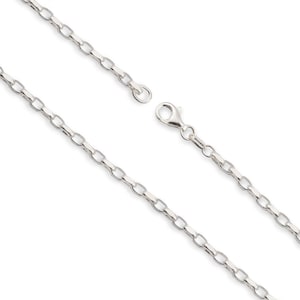 May include: A silver chain necklace with a lobster clasp fastening. The chain is made of small, square-shaped links.