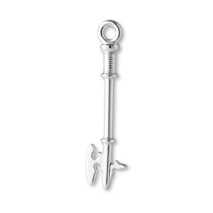 May include: A silver-colored key pendant with a detailed design. The pendant features a key shape with a loop at the top, a textured middle section, and a decorative key bit at the bottom. The key is made of a shiny metal.