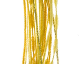 May include: A collection of yellow and gold pipe cleaners against a white background. The pipe cleaners are of varying shades, from a bright yellow to a softer, more muted gold. Some have a metallic gold thread running through them.